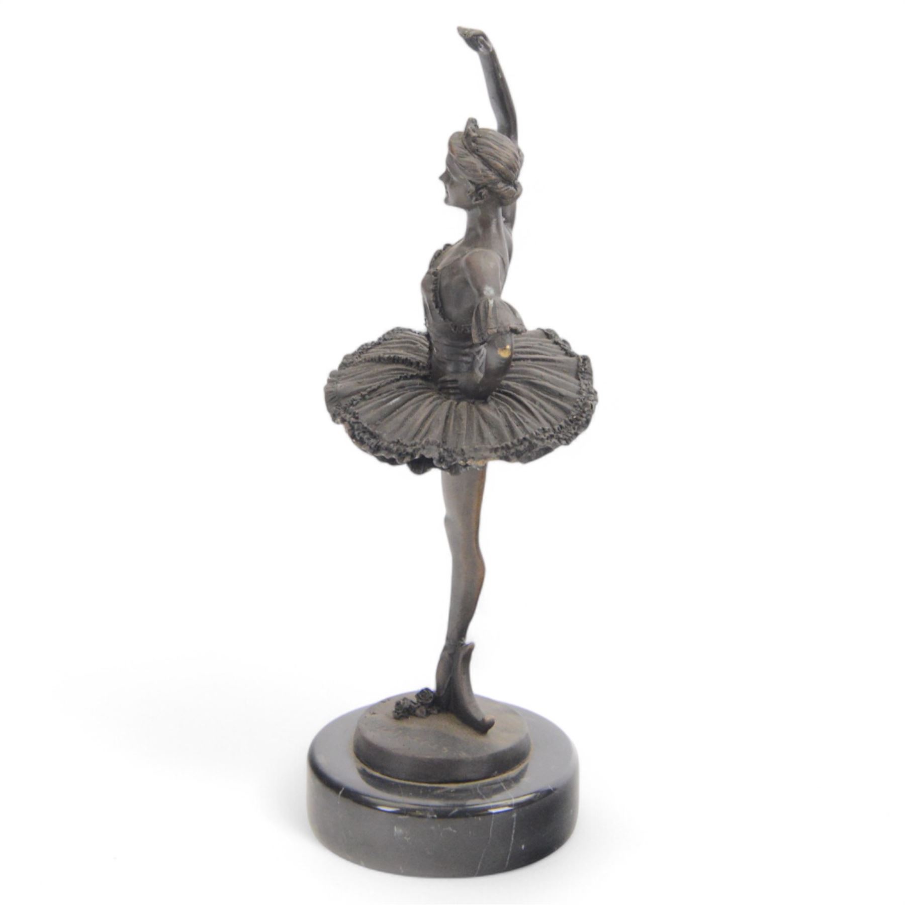 Bronzed figure of a ballerina, signed Chiparis to base, upon circular marble plinth, H32cm
