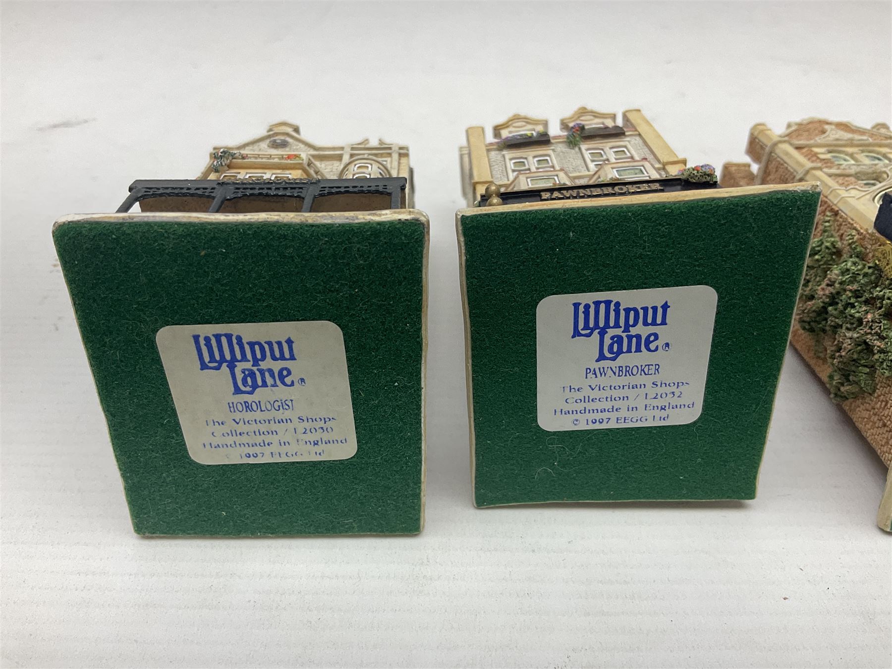 Thirteen Lilliput Lanes from the Shops Collection, including Apothecary, Horologist, China Shop, Penny Sweets, H Samuel etc, all with deeds and original boxes 