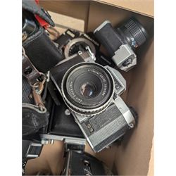 Collection of cameras, including Canon EOS 650, Praktica BMS, Inovar, Praktica MTL3, Zeiss Ikon Contina, etc