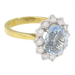 18ct gold oval cut aquamarine and round brilliant cut diamond cluster ring, hallmarked, aquamarine approx 2.55 carat, total diamond weight approx 0.85 carat