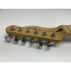 2009 Fender Telecaster electric guitar in black, retro fitted with Charlie Christian copy pick-up, serial no.MZ9546274; L98cm; in Fender soft carrying case