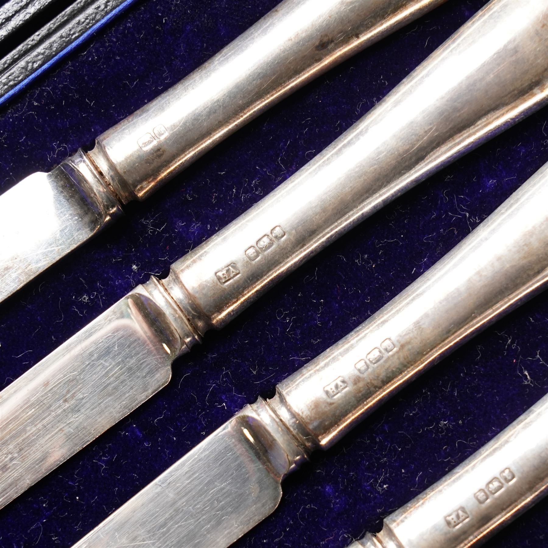 Set of six silver coffee spoons with examples of various British hallmarks , boxed, a set of six silver coffee spoons Sheffield 1925 Maker John Round & Son Ltd and six silver handled pastry knives