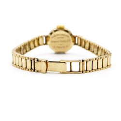 Ernest Borel ladies 9ct gold manual wind presentation wristwatch, silvered dial with baton hour markers, retailed by Mappin, on integral 9ct gold bracelet, London 1962