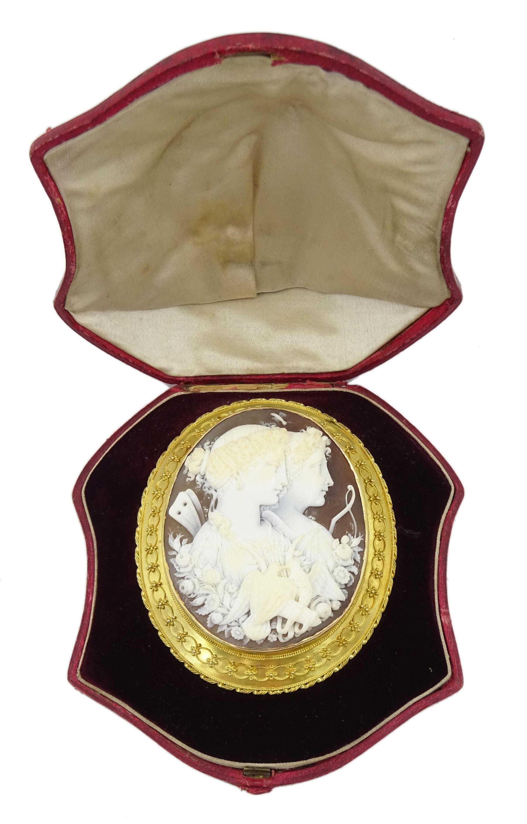 Victorian fine cameo brooch depicting Cupid and Psyche, in 18ct gold Etruscan Revival gold wirework mount, the reverse indistinctly signed Lamary, in original fitted silk and velvet lined case