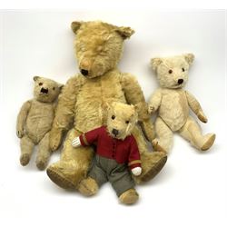 Four Chiltern teddy bears 1930s-50s, including white one with revolving head, glass type eyes, vertically stitched nose and mouth and jointed limbs with felt paw pads H16.5