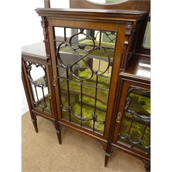  Edwardian mahogany mirror back display cabinet, arched cresting rail with carved classical urn and foliage, three bevel edge mirrors, moulded top, three astragal glazed doors enclosing lined interior, square tapering supports, W136cm, H211cm, D45cm  