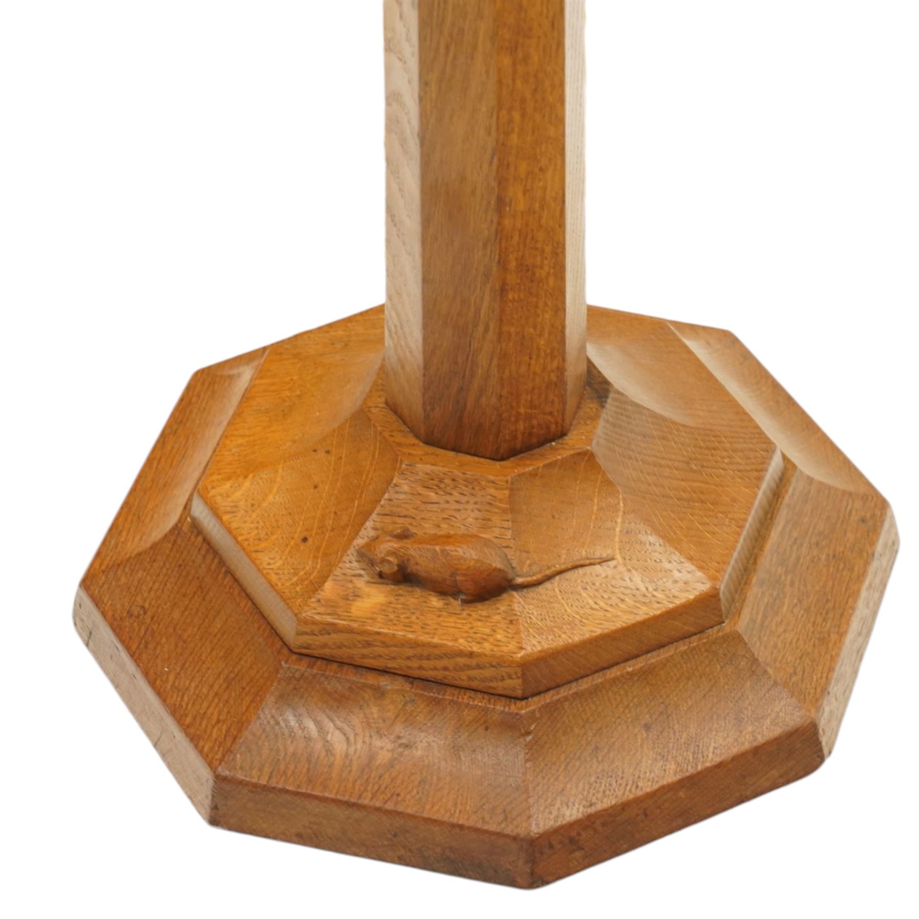 Mouseman - oak standard lamp, the turned octagonal column terminating to a stepped cavetto octagonal base, with carved mouse signature, by the workshop of Robert Thompson of Kilburn
