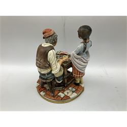 Capodimonte figure group modelled as a cobbler fixing a girl's shoe, marked beneath, H26cm