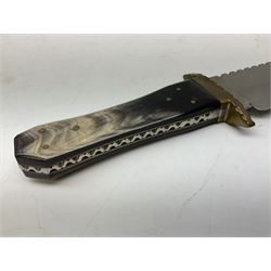Large Bowie knife the 26.5cm steel blade marked J.E. Middleton & Sons Rockingham Street Sheffield with brass cross-piece and polished horn grip scales; in leather sheath L42cm overall