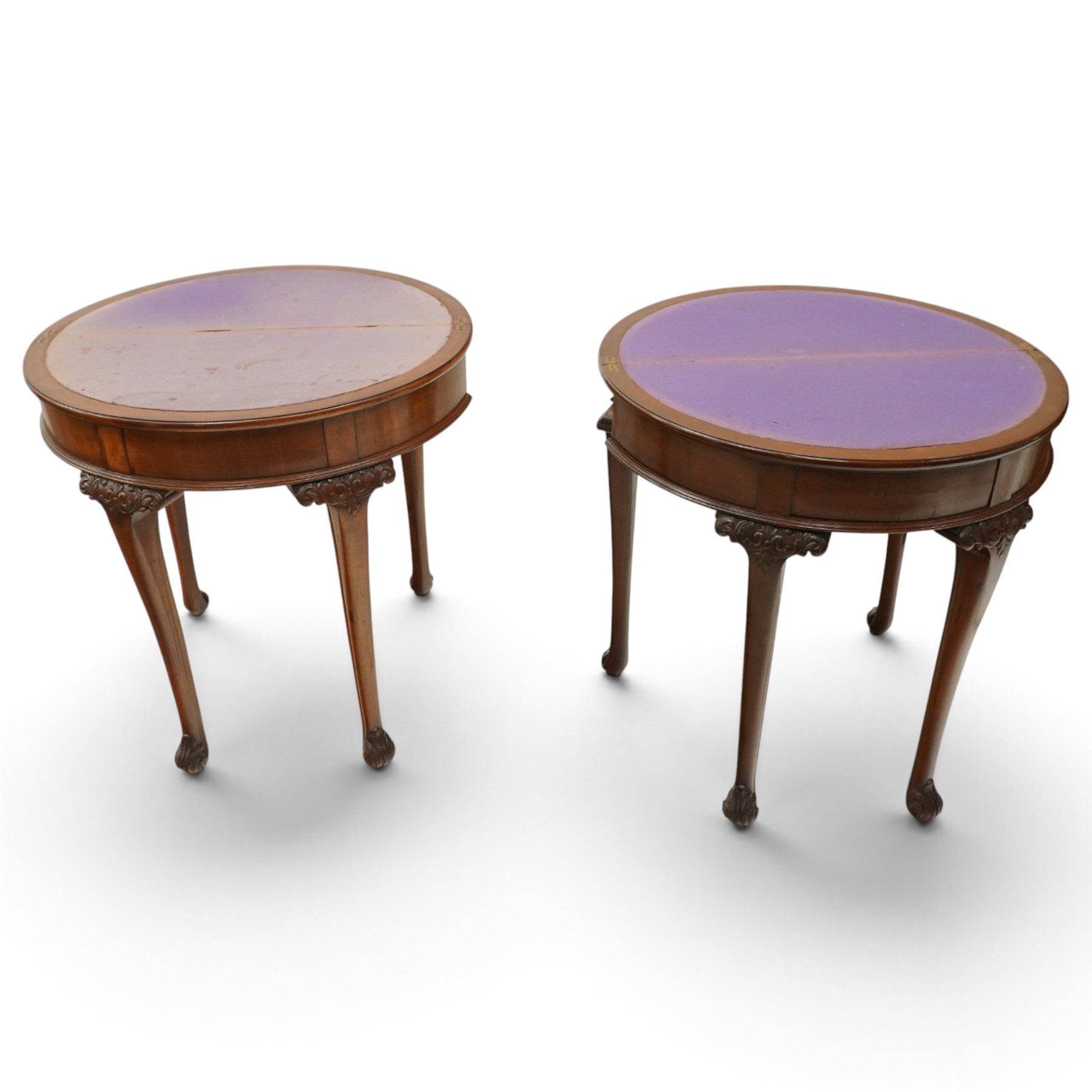 Pair of Victorian mahogany demi-lune card tables, the lunette shaped fold-over top enclosing purple-baize lined interior and supported by gate-leg action, banded frieze over cabriole supports with scrolling acanthus leaf knees, terminating to scrolled foliate feet
