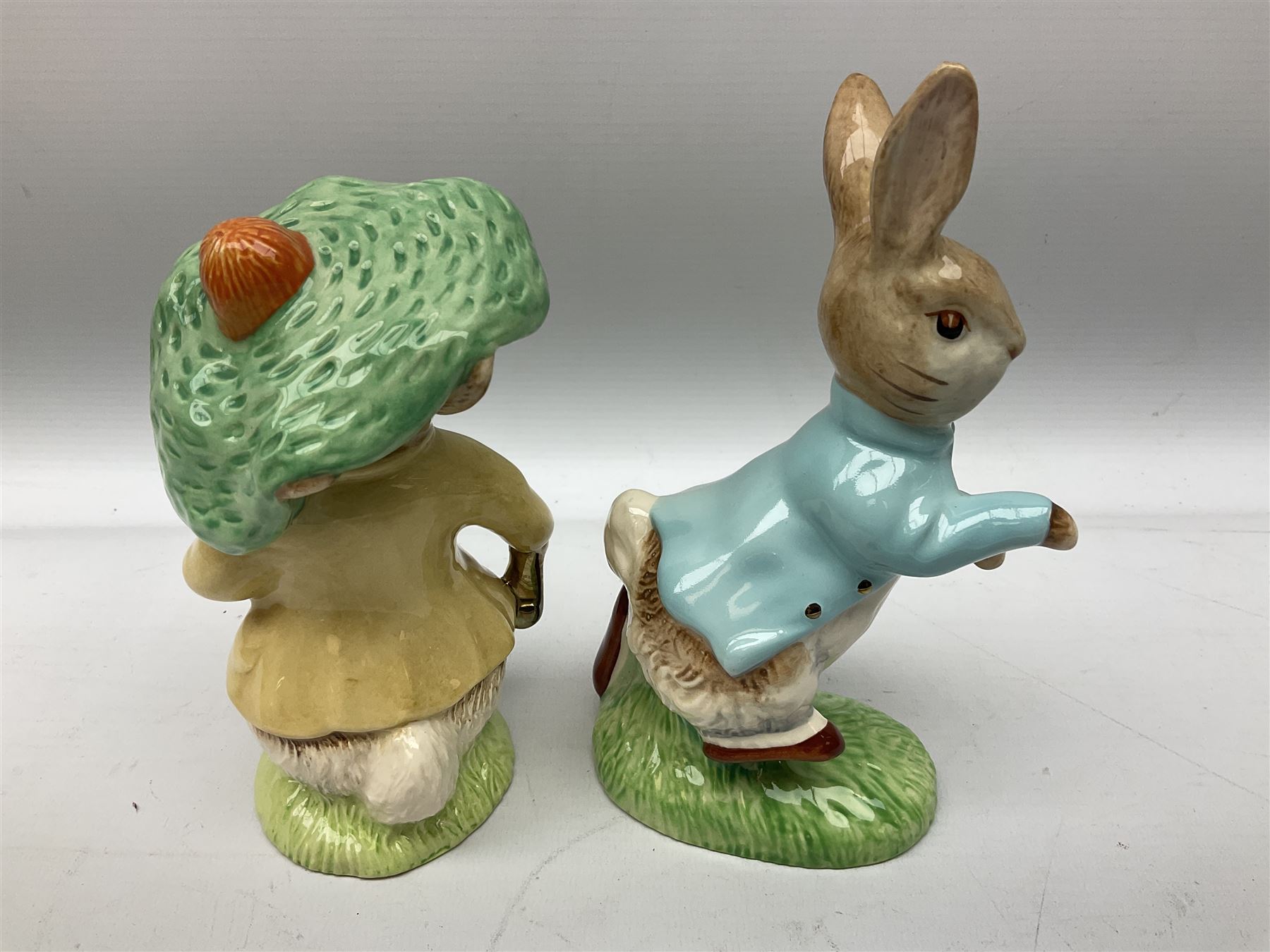 Collection of Beswick figures to include Beatrix Potter Squirrel Nutkin, Jemima Puddleduck, Spike and Tyke, Tom and Jerry, both boxed and with certificates, Chamois 1551 and Babycham 1615a (a/f) Beswick Ware Royal Douton Peter Rabbit and Benjamin Bunny, with certificate
(9)
