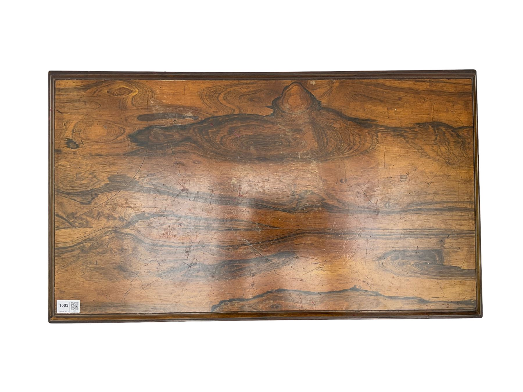 19th century rosewood opium table, rectangular top with moulded edge, the shaped apron decorated with applied brass scrolling foliate detail, raised on shaped supports with stylised leaf feet and cockbeaded edge