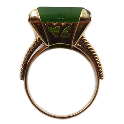  Gold emerald cut jade ring, stamped F.14K  