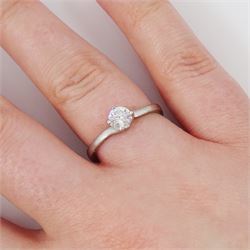Platinum diamond ring, four claw set with a single round brilliant cut diamond of approx 0.50 carat, hallmarked