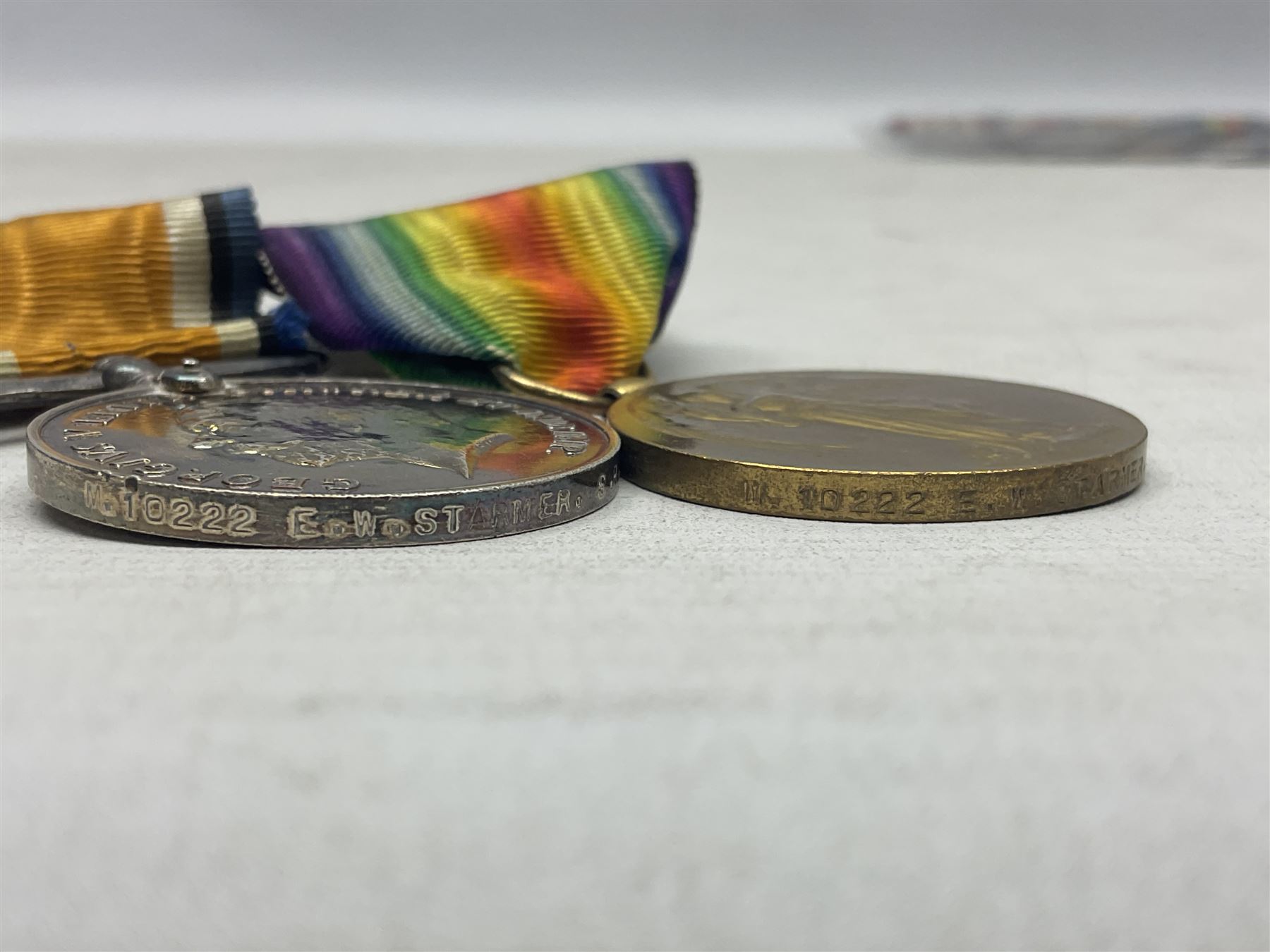WW1 Naval group of four medals comprising British War Medal, 1914-15 Star and Victory Medal awarded to M.10222 E.W. Starmer J.R.A. (later S.R.A.) R.N.; and St. John Ambulance Brigade Coronation 1911 Medal to Pte. E.W. Starmer; all with ribbons