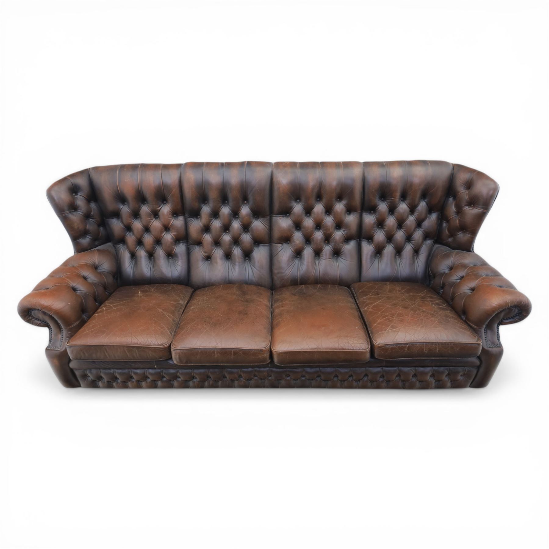 Georgian design Chesterfield lounge suite, comprising highbacked four seat sofa and pair armchairs, upholstered in chocolate brown leather, Armchairs (H 90cm, W 91cm) Sofa (H 91cm, W 238cm)
