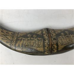 Carved water buffalo horn wall pocket, engraved with landscape scene with patterned borders with pierced foliate panel, together with a pair of horns with similar engraved decoration, L47cm