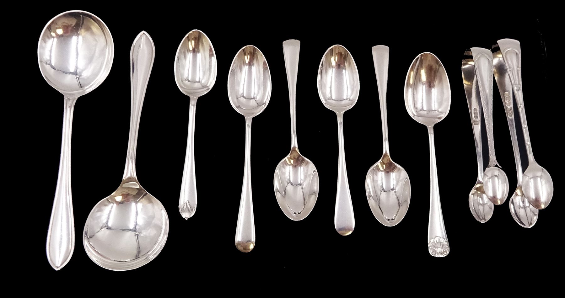 Group of silver flatware, to include set of three 1930s Old English pattern coffee spoons, hallmarked Z Barraclough & Sons, London 1938, pair of silver Celtic Point pattern spoons, hallmarked Viner's Ltd, Sheffield 1952, two pairs of silver sugar tongs, the first example with bamboo decoration, hallmarked Elkington & Co Ltd, Birmingham 1904 and the second example hallmarked Cooper Brothers & Sons Ltd, Sheffield 1915, etc 