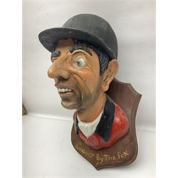 Composite figure of the head of a huntsman on a shield 'Caught by the Fox', D28cm