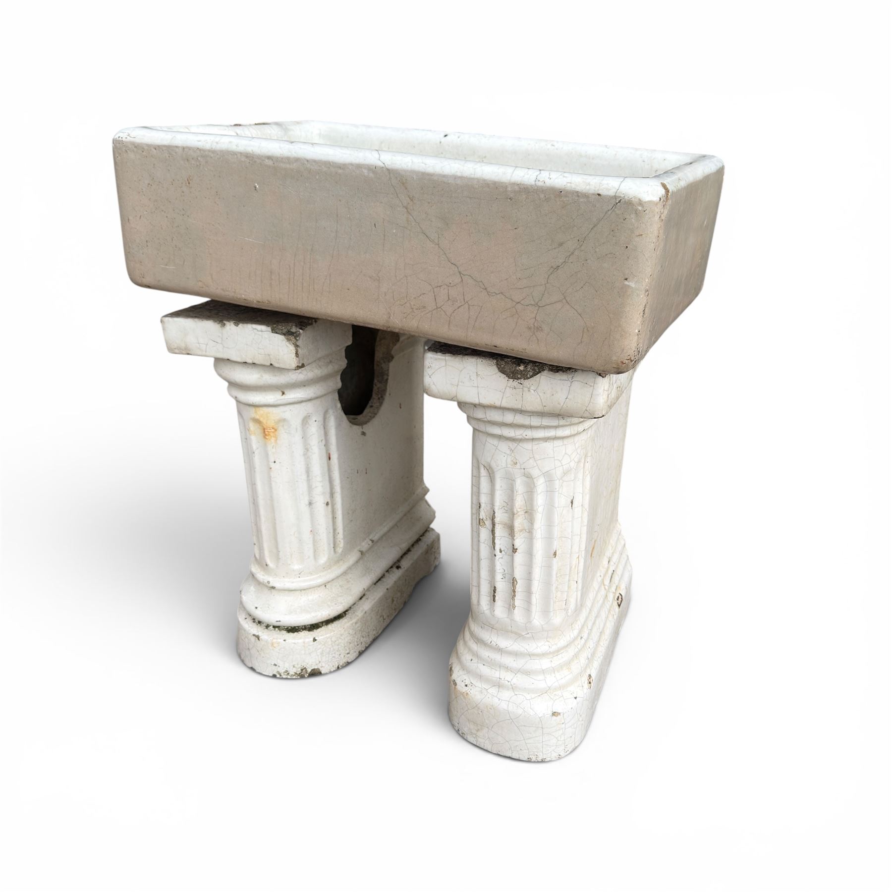 19th century porcelain Belfast sink, raised on two fluted ceramic end supports