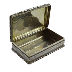 William IV silver rectangular snuff box, foliate decoration with engine turned side panels and base by Nathaniel Mills, Birmingham 1833, approx 4.75oz
