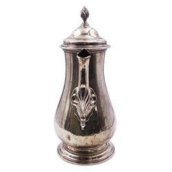 George III silver coffee pot, of baluster form with foliate detail to spout, flambeau finial to the hinged cover and wooden scroll handle, upon a stepped circular foot, hallmarked Francis Crump, London 1876, gross weight 27.85 ozt (866.3 grams)