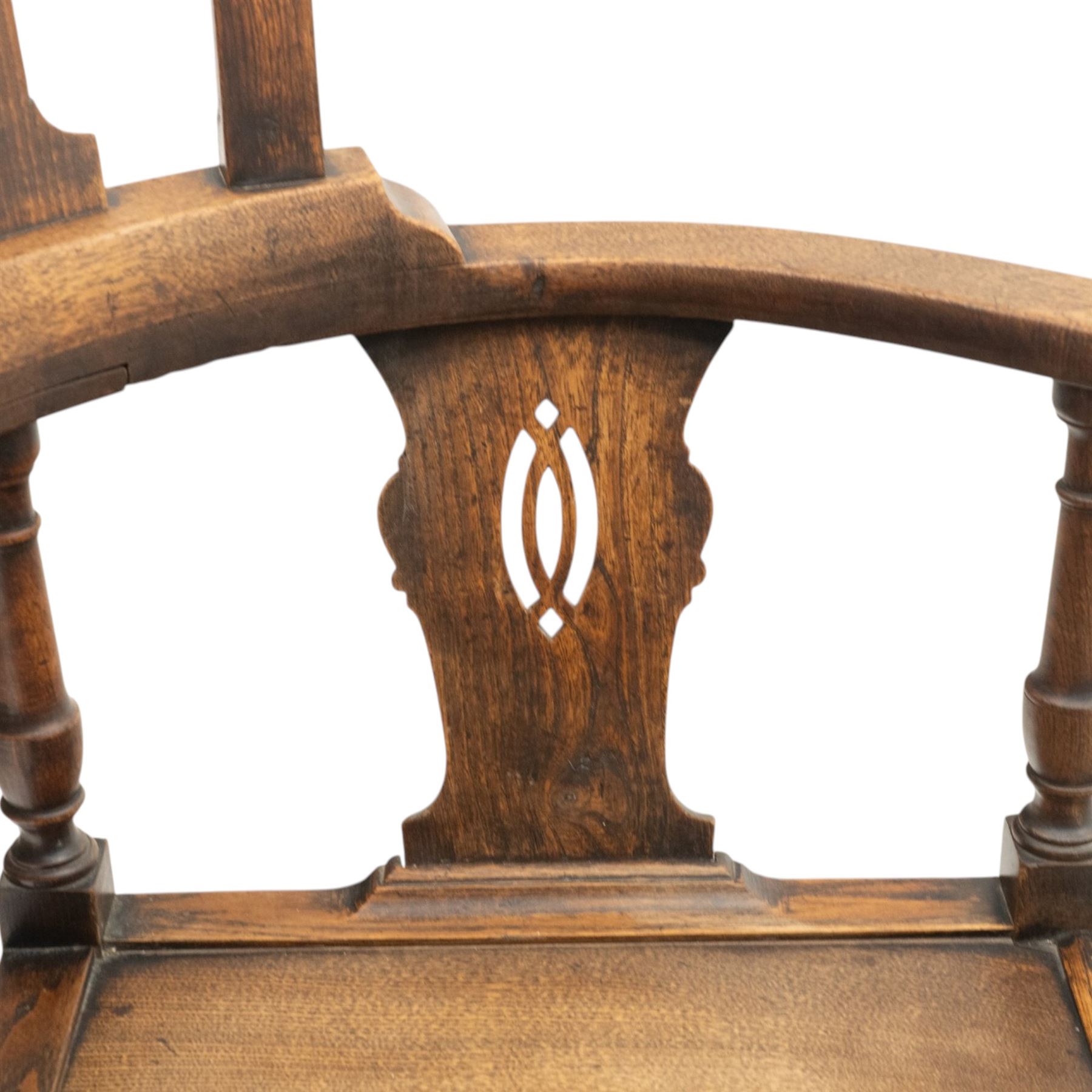 19th century elm high-backed corner chair, shaped cresting rail over three pierced vasiform splats and out-swept arms, square panelled seat over square supports united by X-stretcher