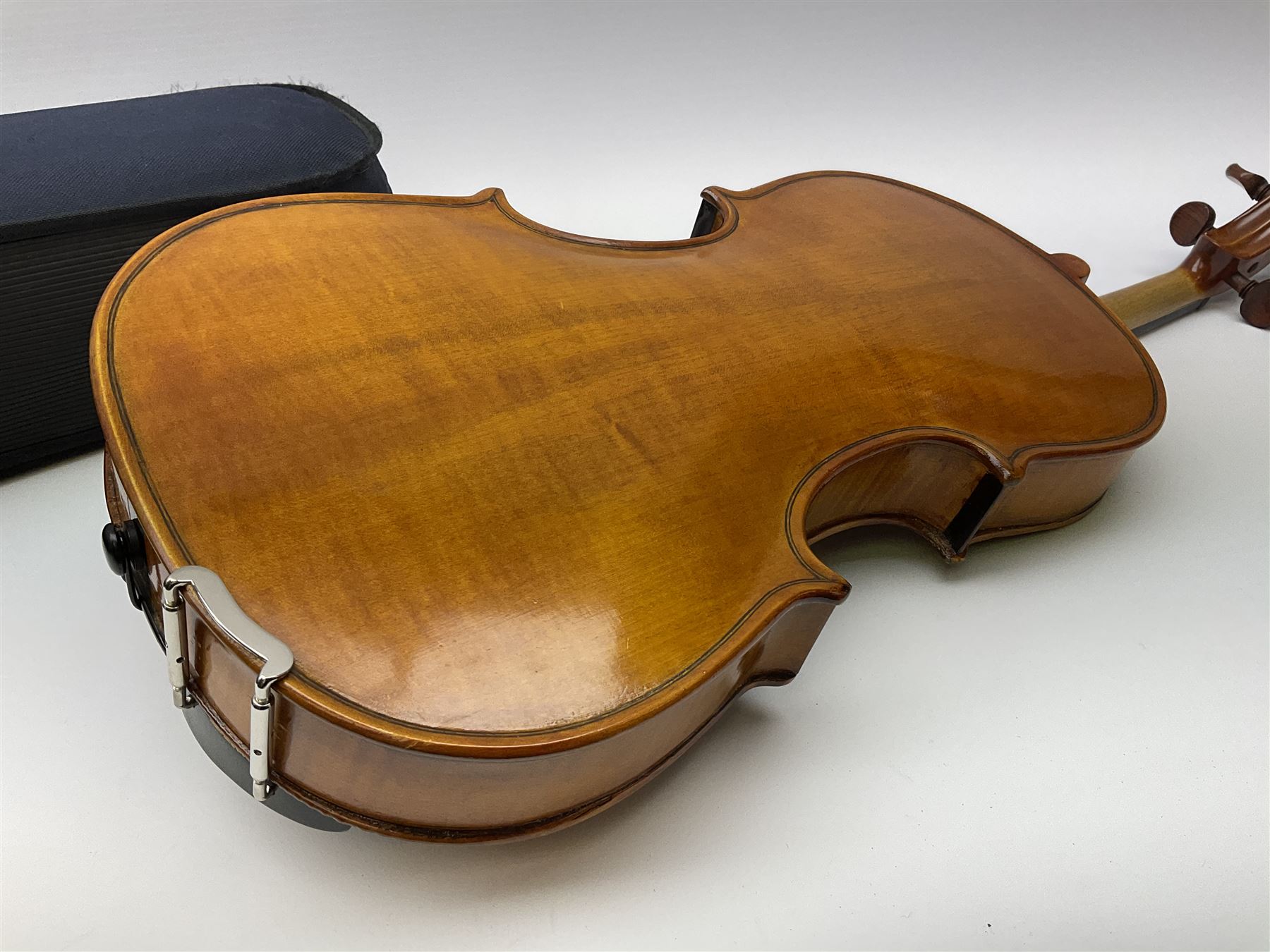 1920s continental large viola with 42cm two-piece maple back and ribs and wide grain sprucewood top with guarnerie sound holes, bears label 'Werner Alajos Budapest', overall length 69cm; in modern carrying case