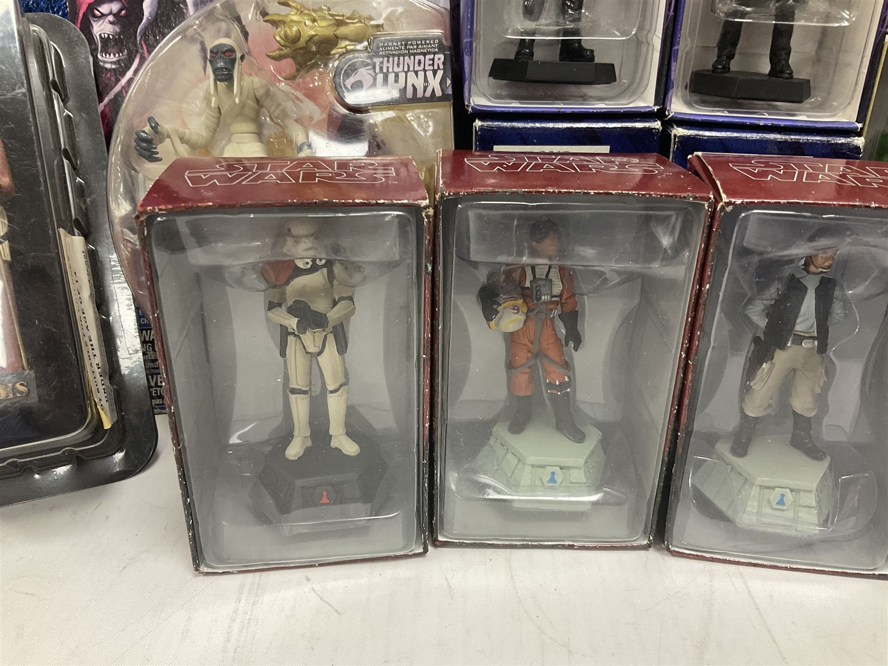 Miscellaneous toys to include Robert Harrop Fun Figurines of Captain Scarlet and Thunderbirds Braman the Robot; Thundercats Thundertank and Mumm-Ra; Stargate Mastadge Beast of Burden; various periodical issue metal figures for Star Wars, Buffy the Vampire Slayer, James Bond etc; all boxed (18)