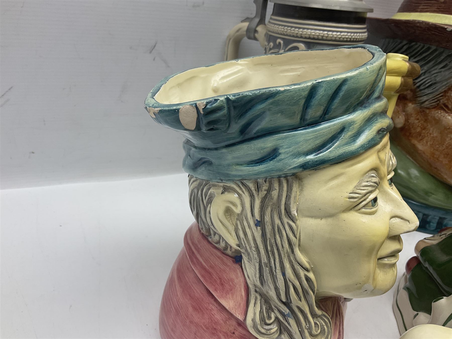 Collection of toby jugs and character jugs, to include Royal Doulton Winston Churchill and Neptune, together with Staffordshire Character Jugs examples  