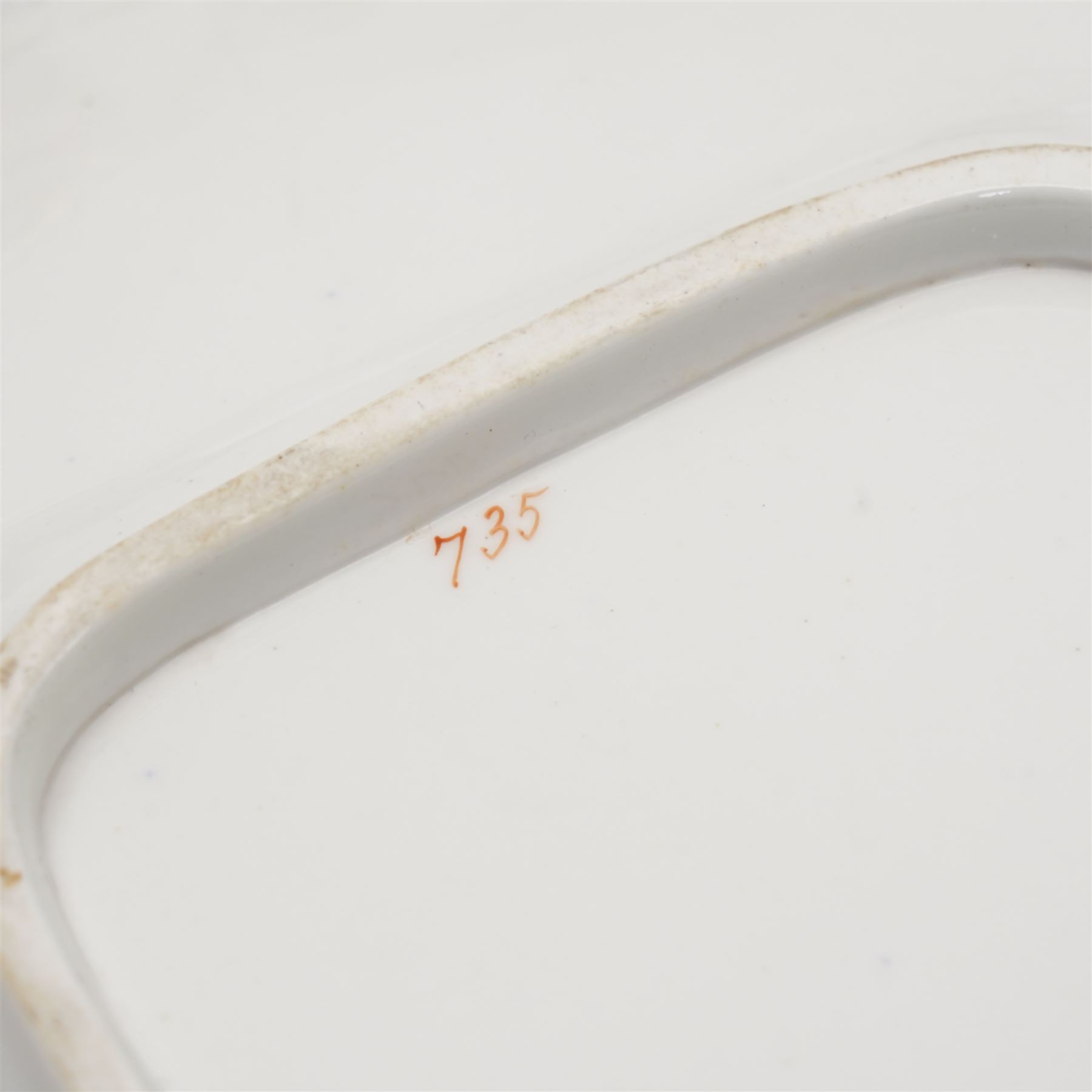 19th century porcelain part tea service, probably Spode, comprising sucrier, milk jug, sandwich plate, seven cups and two saucers, decorated with floral sprays, within cobalt blue and gilt borders, pattern no. 735 