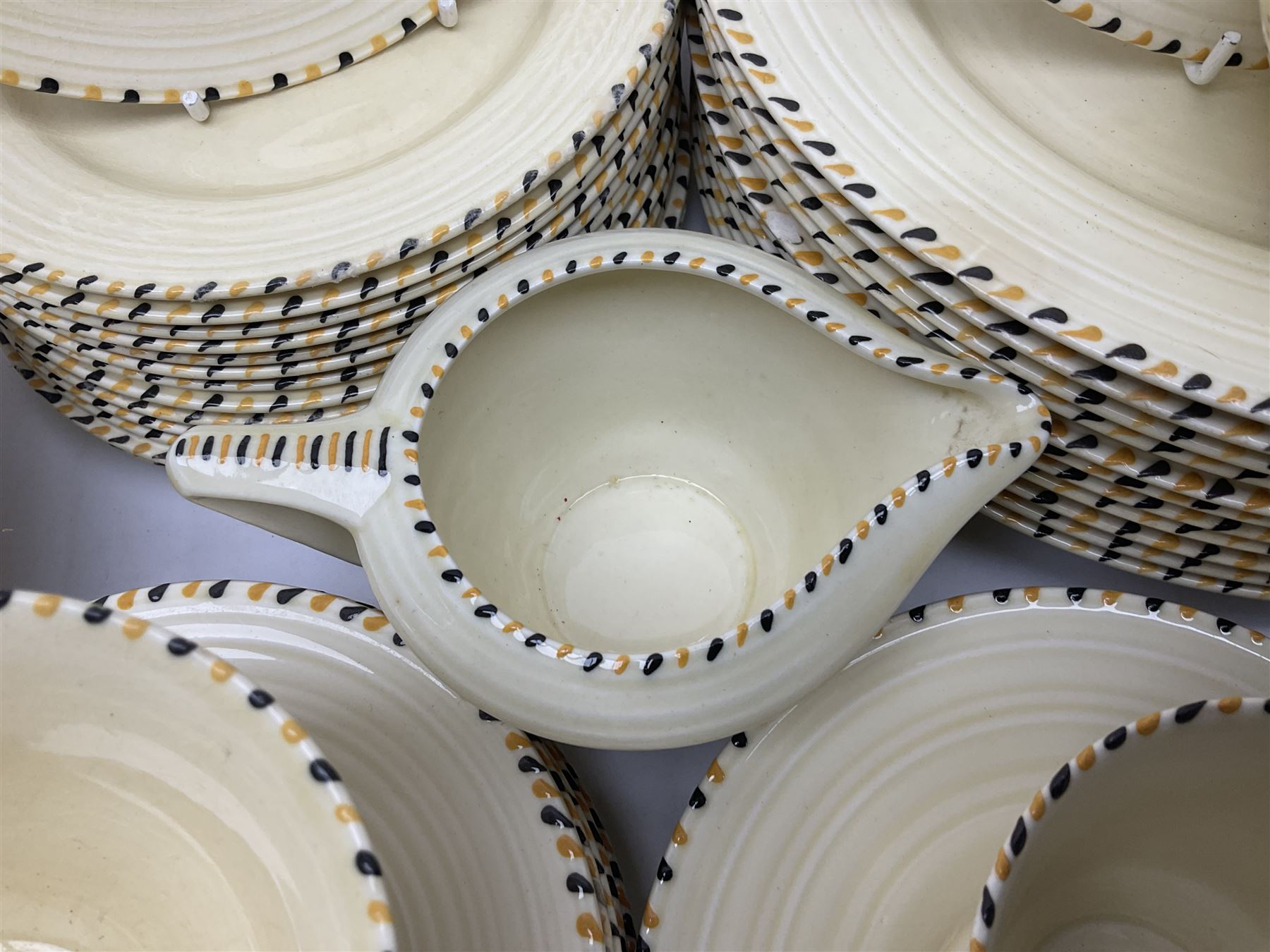 Art Deco Crown Ducal tea and dinner wares, reg no. 784158, comprising dinner plates, teacups, saucers, coffee cups, crescent shaped side plates, bowls, eggcups, etc, (93)