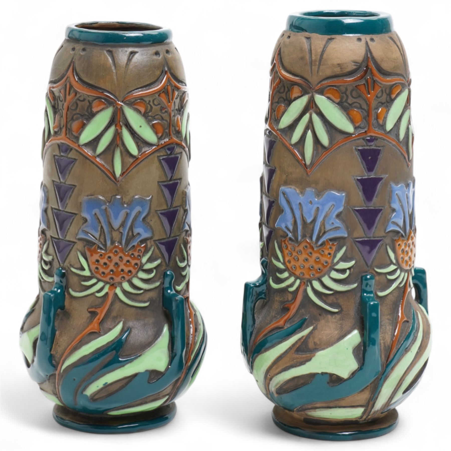 Pair of early 20th century Austrian Amphora vases, of tubular form, decorated with Art Nouveau style thistles and leaves, impressed marks to base including a crown, H25.5cm (2)