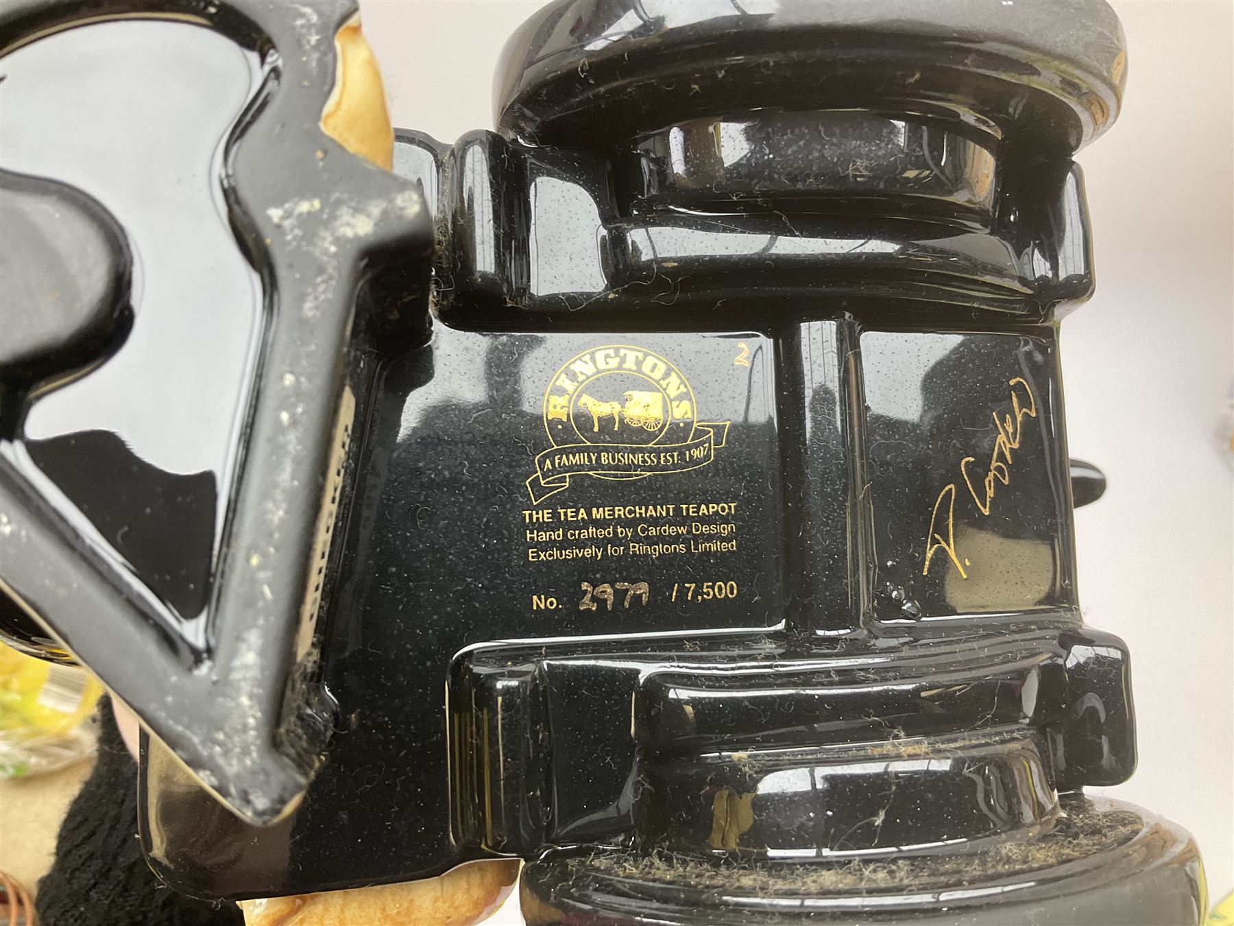 Ringtons novelty teapots, comprising the Ringtons Delivery Van teapot, and the Tea Merchant teapot, both with boxes and certificates of ownership.