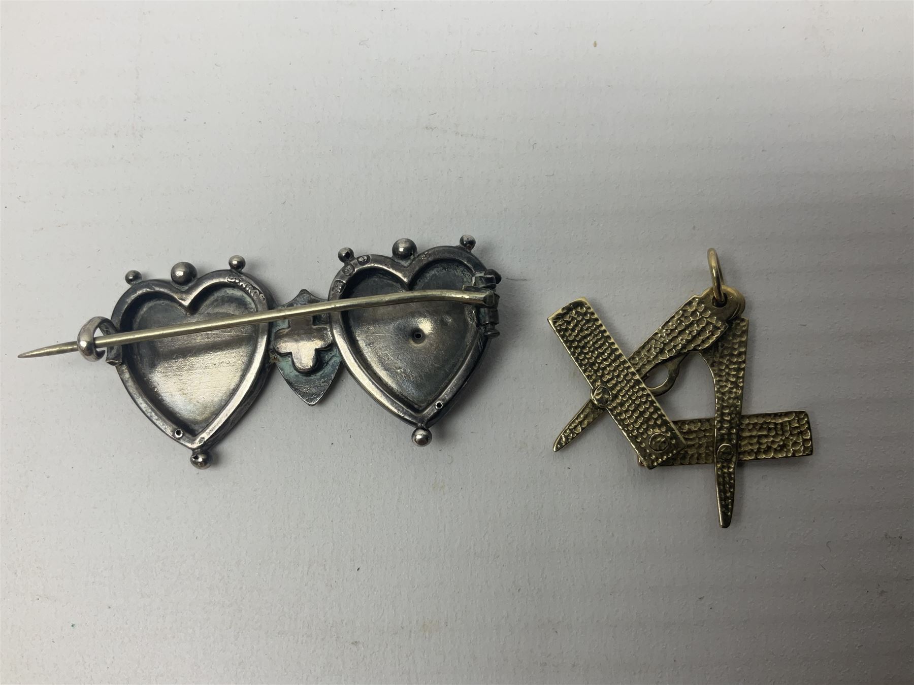 9ct gold Masonic compass initial C pendant, and a Victorian silver sweetheart brooch, commemorating the Diamond Jubilee of Queen Victoria