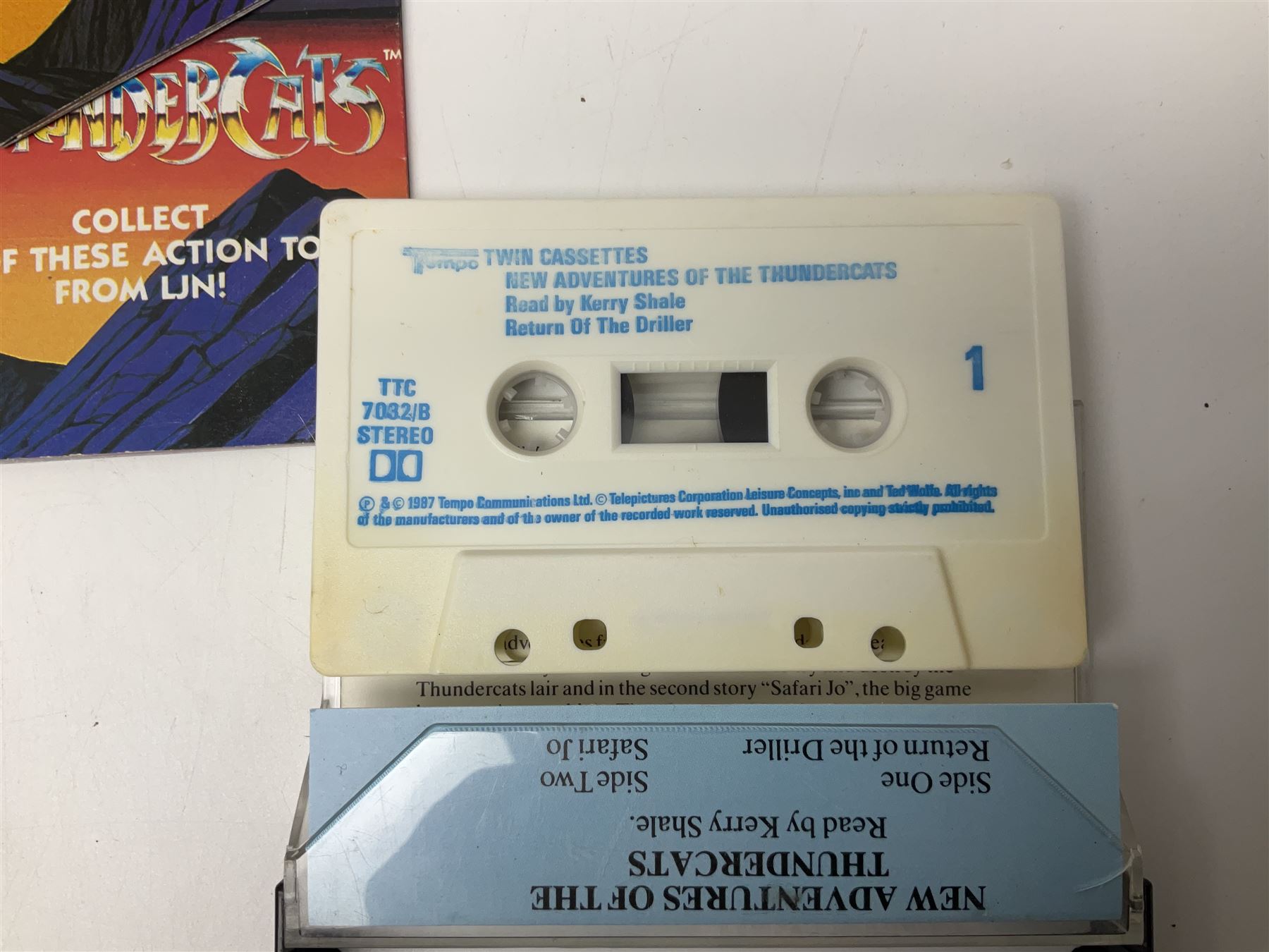 Five 1980s LJN Thundercats figures - Lion-O with sword, Snowman, S-S-Slythe, Tygra and Mumm-Ra; all re-bagged on original backing cards; partially stocked Panini sticker album; story cassette tape and three catalogues; together with Ghostbusters Slimer with food and Comic