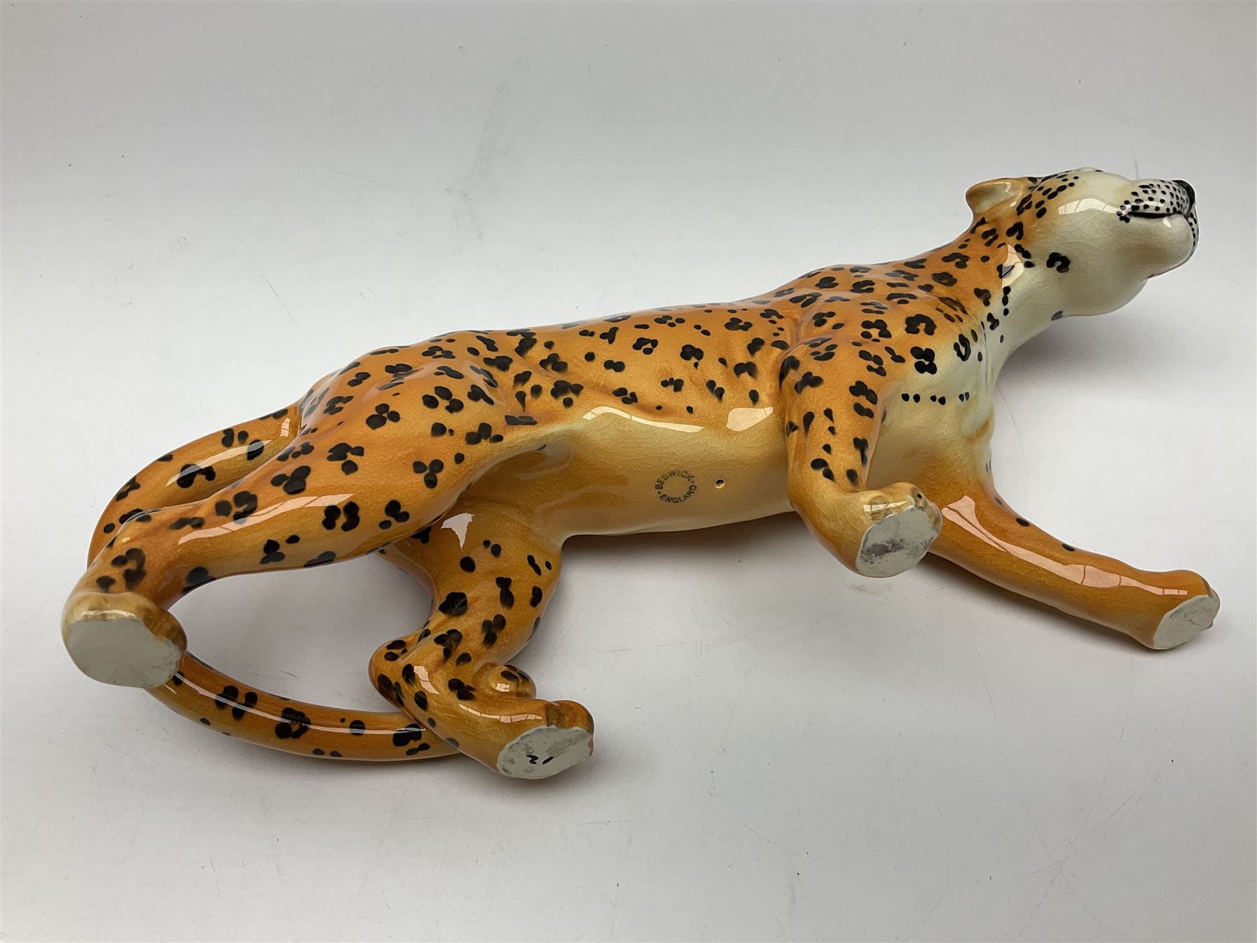 Group of Beswick figures to include leopard no 1082, rabbits, swan, pheasant no 1226 etc, all with marks beneath
