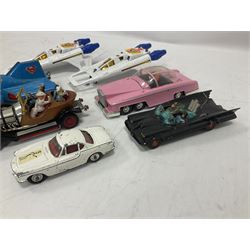 Corgi - seven unboxed and playworn TV/Film related die-cast models including Chitty Chitty Bang Bang with all four figures, Batmobile with both figures, Lady Penelope's FAB 1 with both figures, Superman Supermobile, two Buck Rogers Starfighters and The Saint's Volvo P.1800 (7)