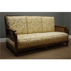  Early 20th century bergere lounge suite three seats sofa (W170cm, D84cm), pair matching armchairs (W71cm), with scrolled acanthus carved cresting rails and arm supports, upholstered in gold Damask pattern fabric  