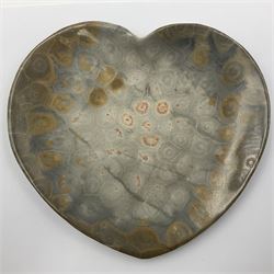 Two graduating fossilised coral dish in the form of hearts, largest D16cm