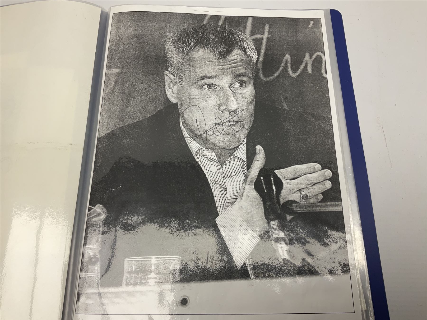 Two folders of over fifty photographs, cards, compliment slips etc of actors, actresses, celebrities, politicians, sports personalities etc, all bearing signatures, including David Frost, Lloyd Grosman, John Suchet, Julia Somerville and othe GMTV presenters, Carol Vorderman, Jackie Collins, Rolf Harris, Timothy Dalton, Pete Postlethwaite, Magnus magnusson, John Major, Kate Moss, Uri Geller, David Beckham, Peter Alliss, Sharon Davies, Kevin Keegan etc