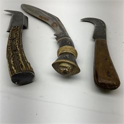Two late 19th/early 20th century billhooks - one blade marked 'Brumby & Middleton' with Victoria cypher and antler grip L30.5cm, the other blade marked 'The Veteran Yates & Co Birmingham' with Calcutta retailer's mark to the ricasso and split wooden grip L26.5cm; together with an Indian kukri (3)