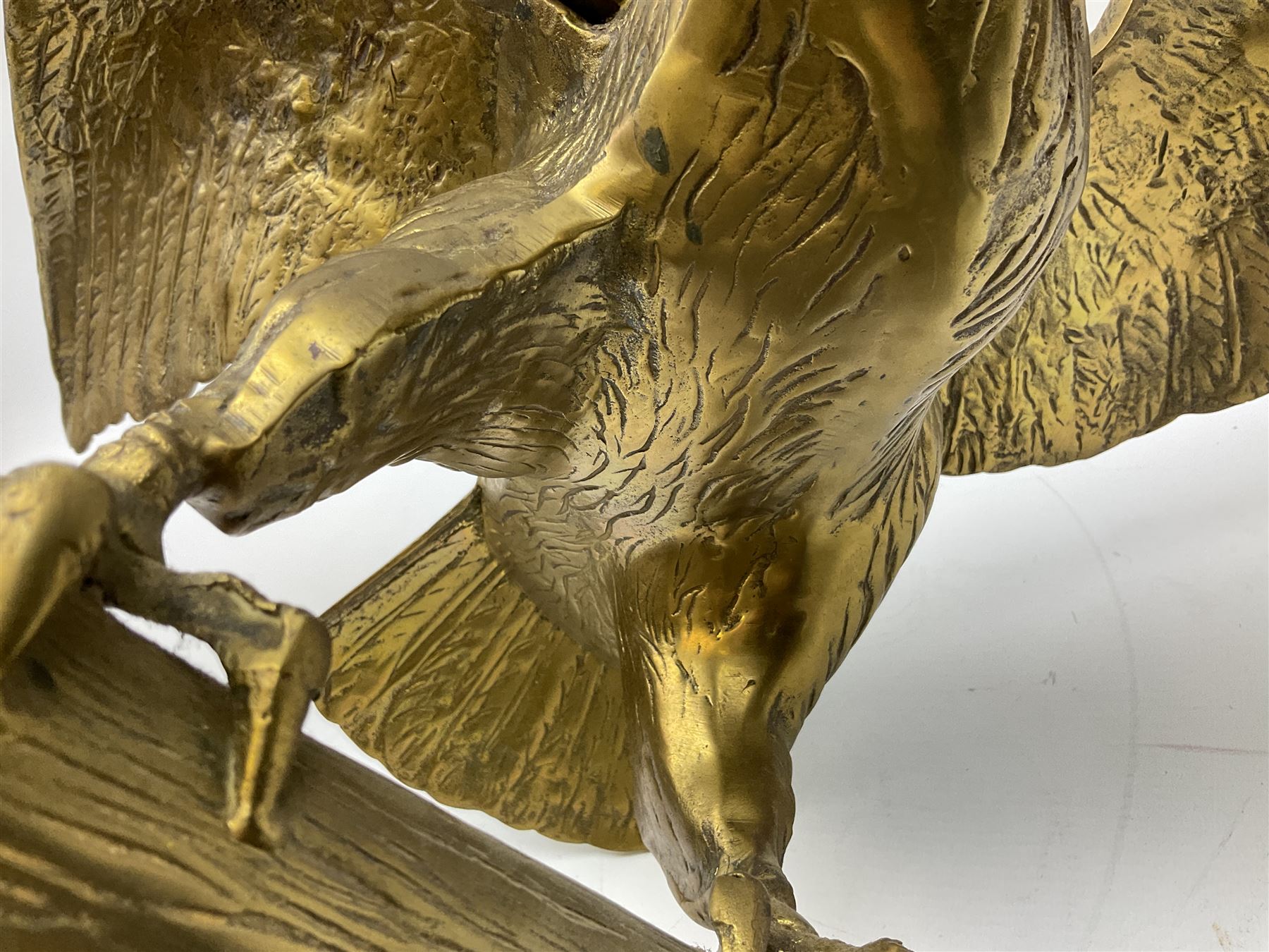 Large brass figure of an eagle on a branch, H51.5cm