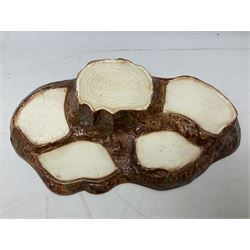 Seven Beswick Beatrix Potter figures, comprising Sally Henny Penny, Johnny Town-Mouse, Mrs Tiggy-Winkle, Mrs Tittlemouse, Tom Kitten, Pig-Wig and Squirrel Nutkin, together with a Beswick tree trunk display stand, stand L30cm