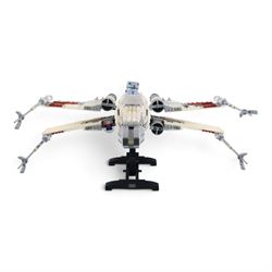 Three Lepin Star Wnrs built models, comprising Red Five X-Wing Starfighter no. 05039, Millennium Falcon no. 05132 and Super Star Destroyer no. 05028
