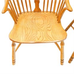 Quality set of six (4+2) golden figured and burr oak Windsor chairs, the yoke-shaped cresting rail over a vasiform shaped splat and spindle back, shaped saddle seat raised on turned supports united by crinoline stretcher