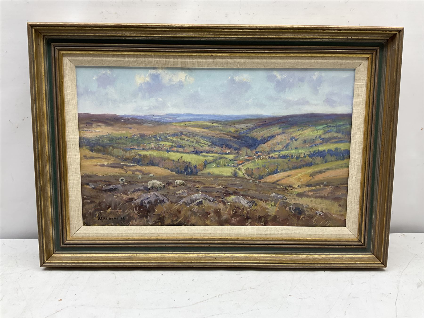Barry Arthur Peckham (British 1945-): Sheep Grazing on Sleights Moor, oil on board signed and dated '74, 29cm x 50cm