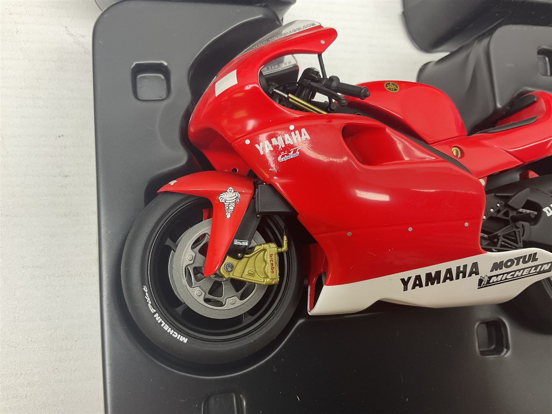 Three Minichamps 1:12 scale die-cast motorcycles - Yamaha YZR 500 Max Biaggi 2000; Yamaha YZR-M1 Colin Edwards Fiat Yamaha Team MotoGP 2007 GP Australia; and Yamaha YZR 500Team Yamaha Max Biaggi 500ccGP 2001; all boxed (3)