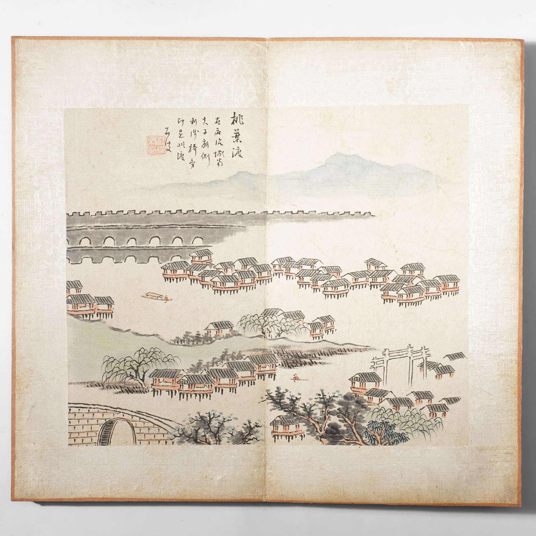 Chinese fold out book, comprising 12 hand-coloured woodblock landscapes each bearing inscription and artists seal  
