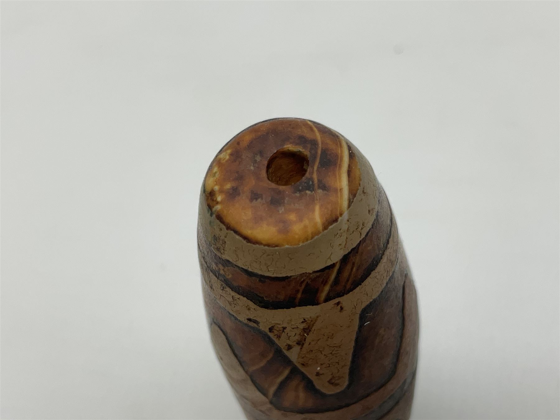 Tibetan dzi bead, decorated with a double tiger tooth pattern, L5cm